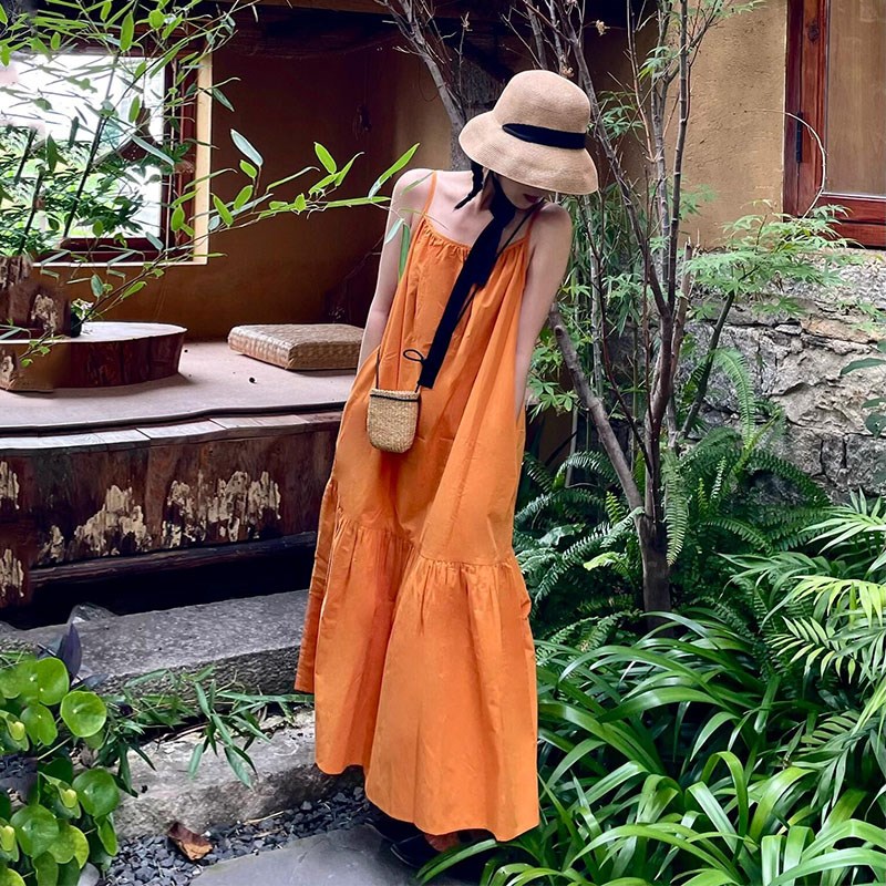 速发裙子汽水夏日吊带橘海边旅游多巴胺穿搭宽松露背衣假大裙摆连