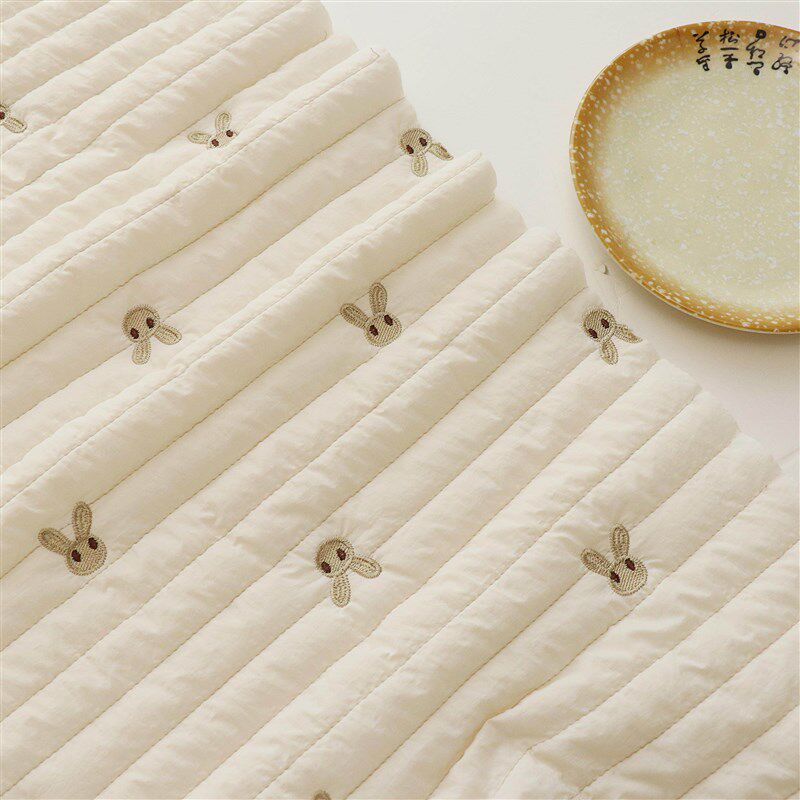 速发is可爱小兔刺绣夹棉绗棉服装面料秋儿童棉服马甲连衣裙布料