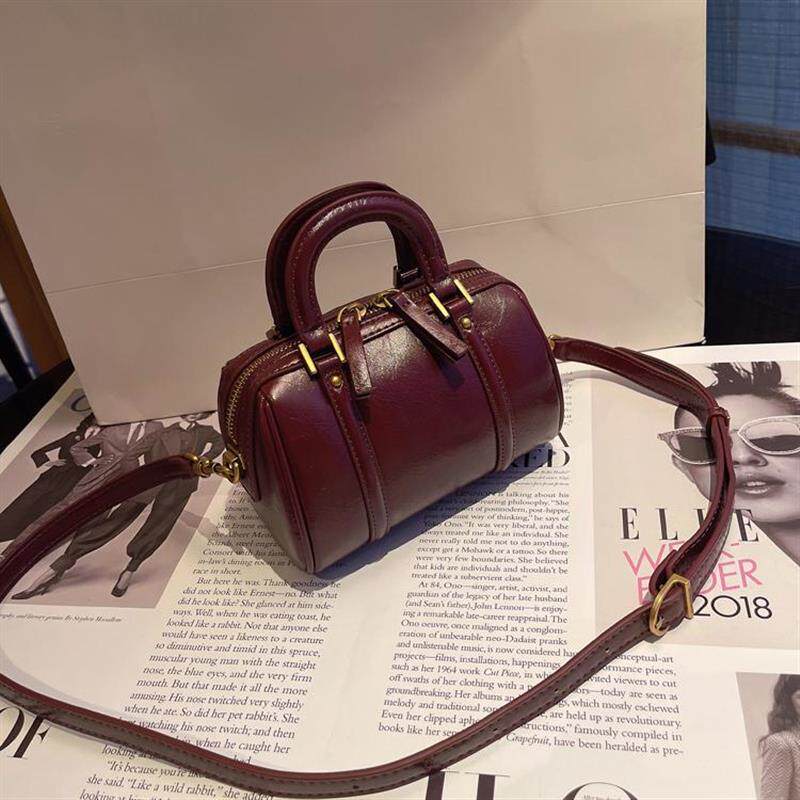 高级感复古软皮枕头包包女2024新款百搭圆筒包小众轻奢手提斜挎包