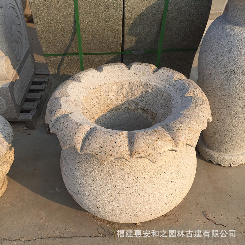 花岗岩石雕圆形花钵养鱼池图