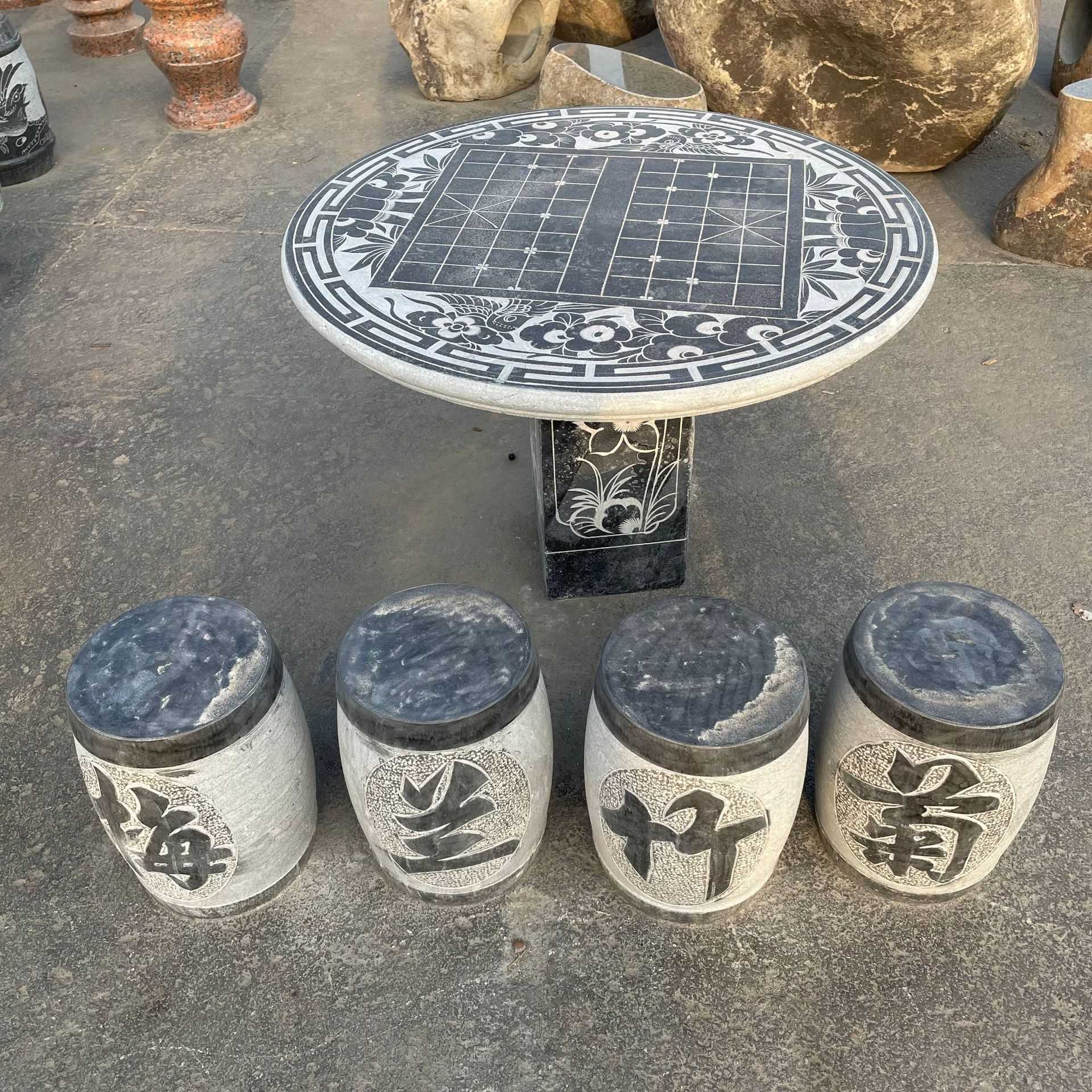 出售石桌石凳戶外休閑棋盤石桌凳庭院別墅青石仿古石圓桌一套