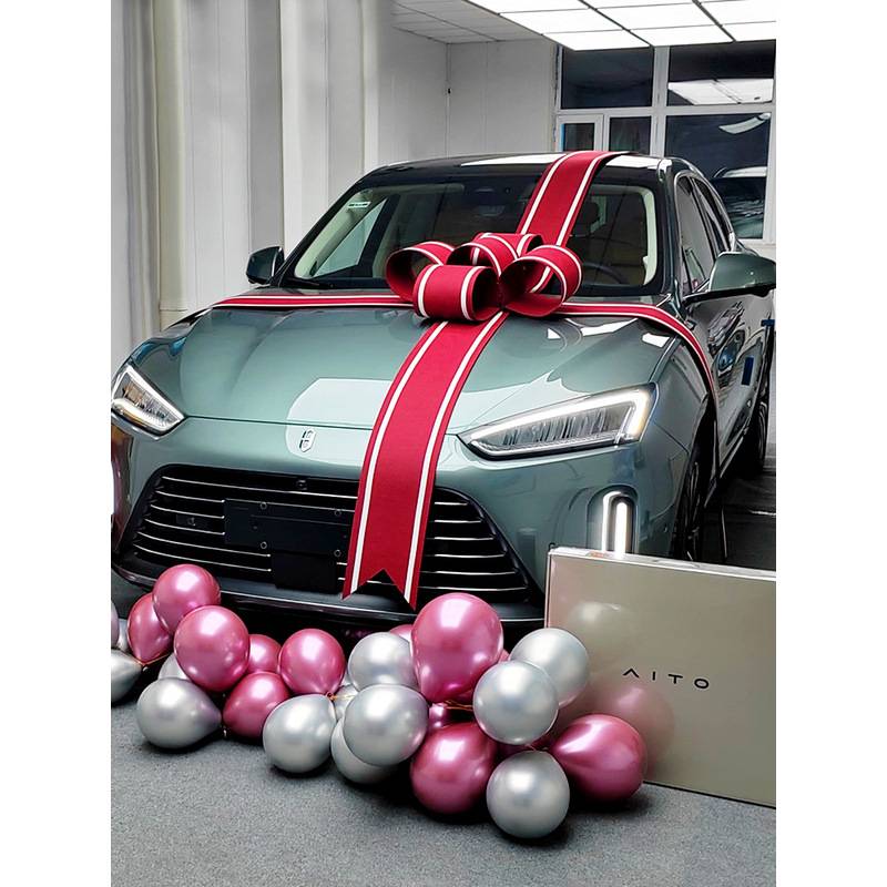 提车交车蝴蝶结大红花4S店展厅氛围花朵新车交付仪式电轿汽车布置