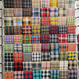 现货色织格子提花面料 热销童装布料批发 秋冬磨毛涤棉 衬衫面料