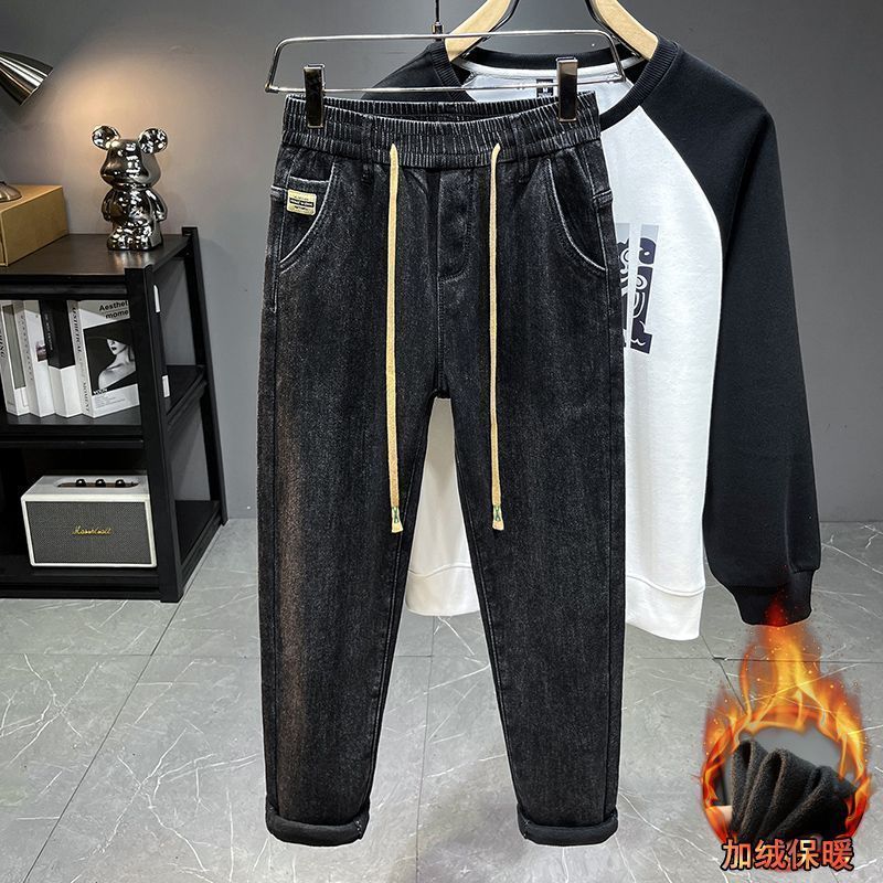 秋冬新款加绒加厚抽绳松紧腰牛仔裤男士潮牌修身小直筒弹力哈伦裤