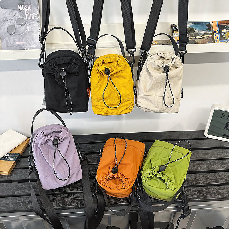 户外运动水壶包新款包包女轻便手机包斜挎包男高颜值登山包防水包