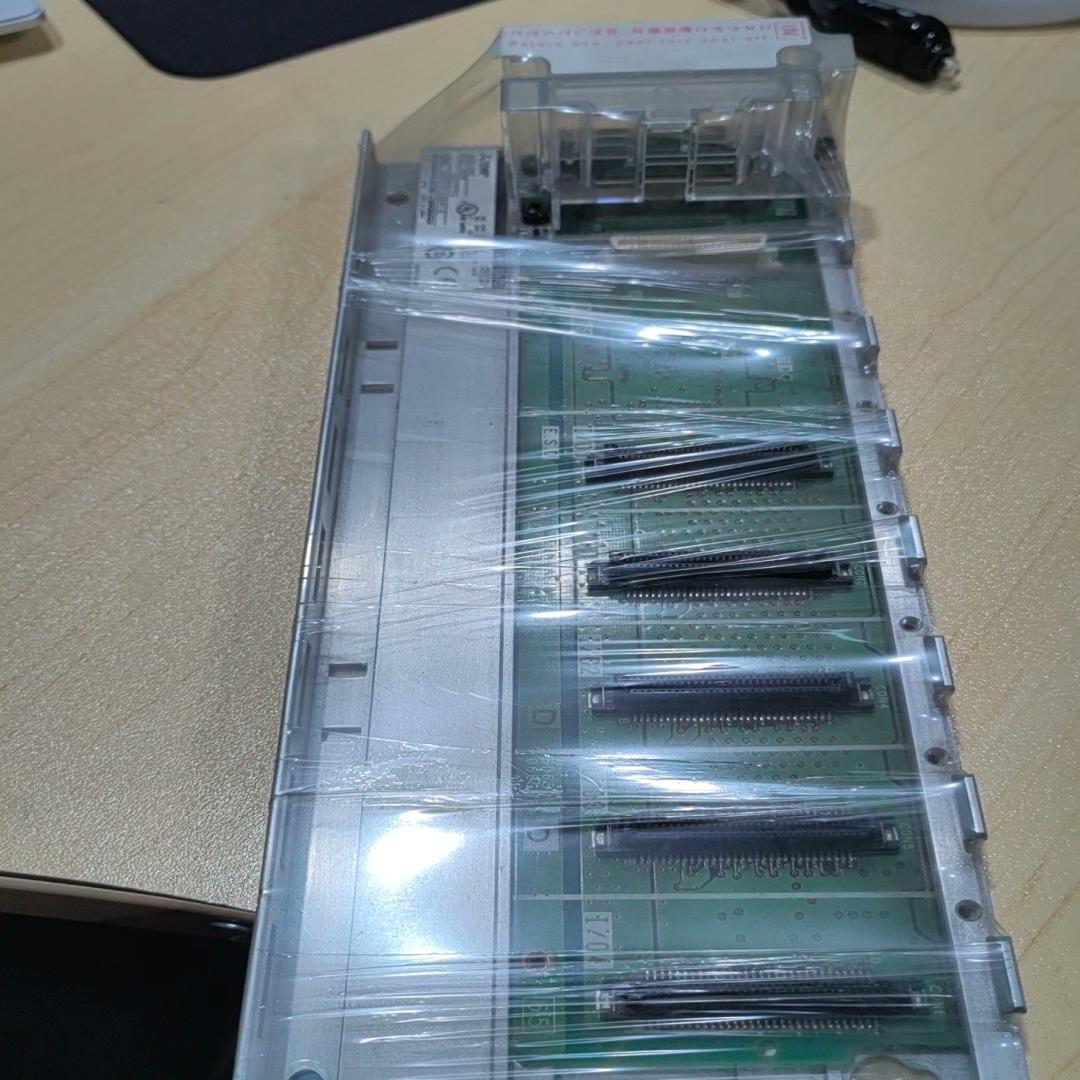 三菱机板Q65B有一个安装开孔扩了议价