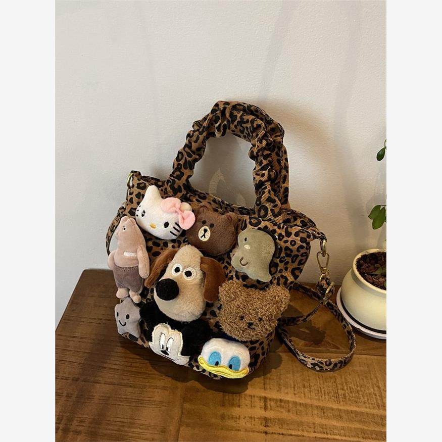 超火小众豹纹帆布包包女款秋冬流行百搭斜挎包可爱卡通手提水桶包