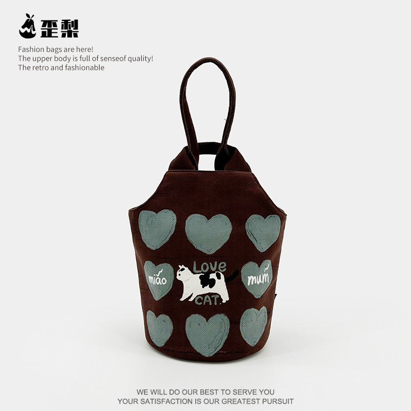 卡通爱心猫咪手拎遛弯水桶包包小众环保高级感通勤百搭帆布收纳袋,收纳整理,购物袋/环保袋/帆布袋,淘宝优惠券,粉丝福利购,淘宝优惠卷