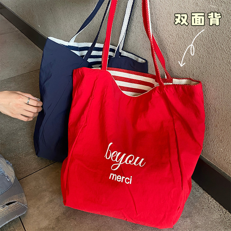 韩系慵懒风红色字母帆布包女款双面背大容量上班通勤单肩托特包包