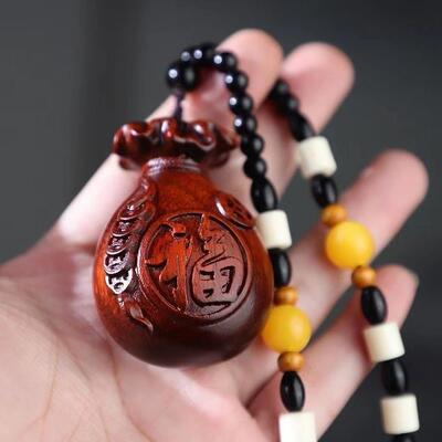 小叶紫檀木雕福袋子钱袋子夜夜数钱手把件招财进宝崖柏木制工艺品