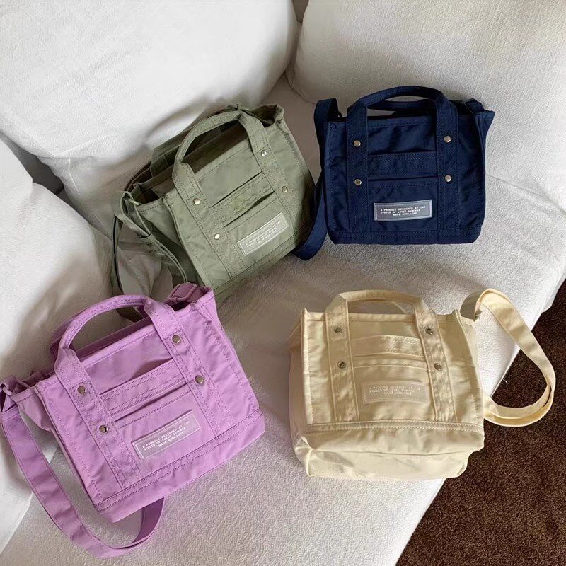2025新款浅春系简约方形v立体水桶包防水轻便尼龙布手提单肩斜挎