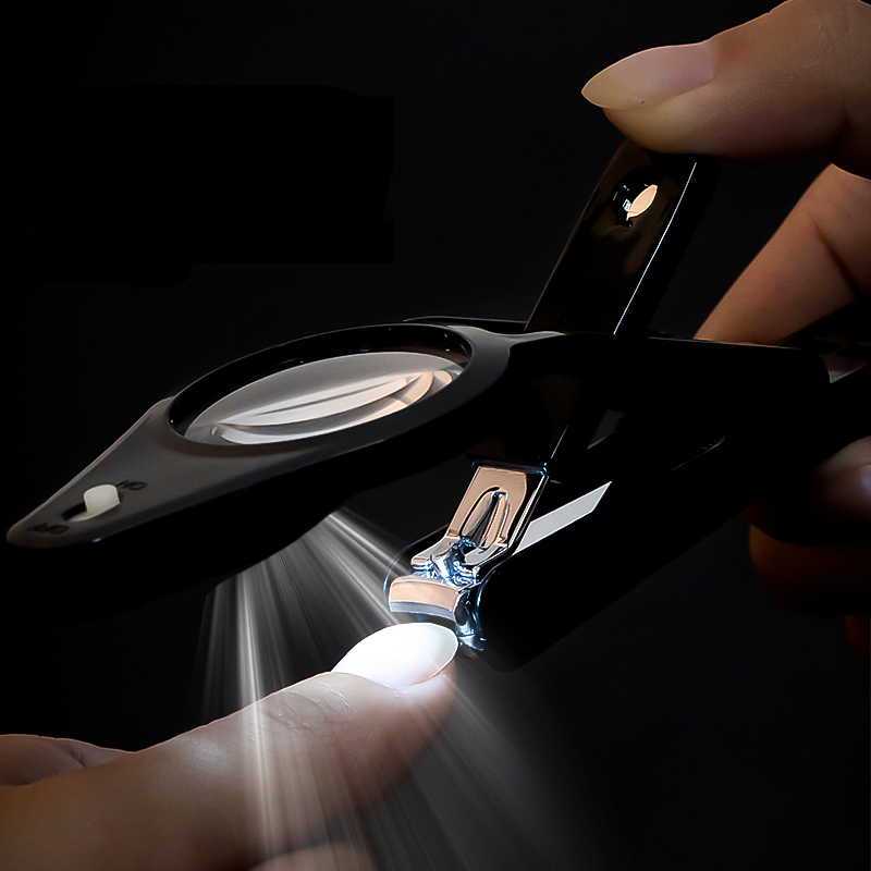 日本指甲剪放大镜指甲钳带灯老人幼儿专用指甲刀大号防飞溅开 ??