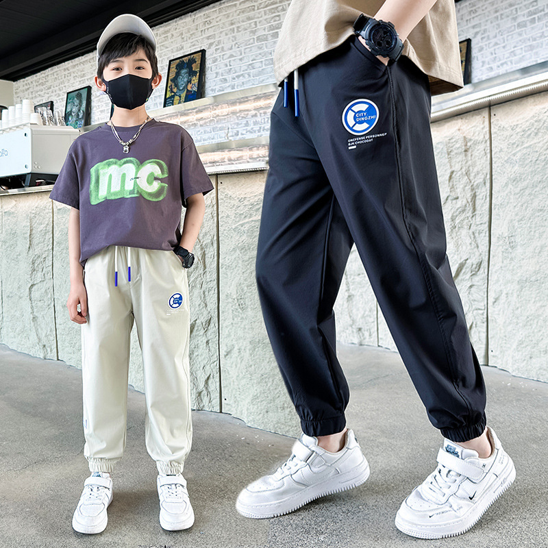 Z971早阳童2023年夏季新款中大童轻薄个性时髦帅气贴标防蚊裤男童