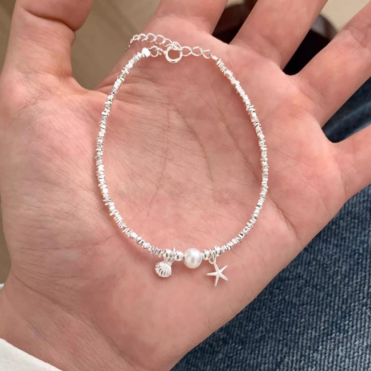 新款不规格海星贝壳碎银子珍珠女手链轻奢学生韩版甜美设计手链
