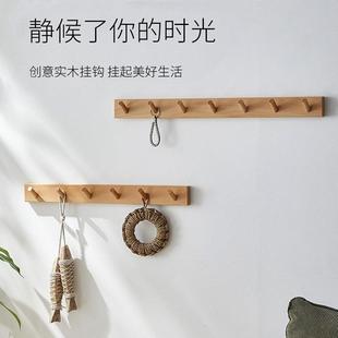 北欧现代简约进门玄关墙上挂钩挂衣架承重门后试衣间实木挂衣钩