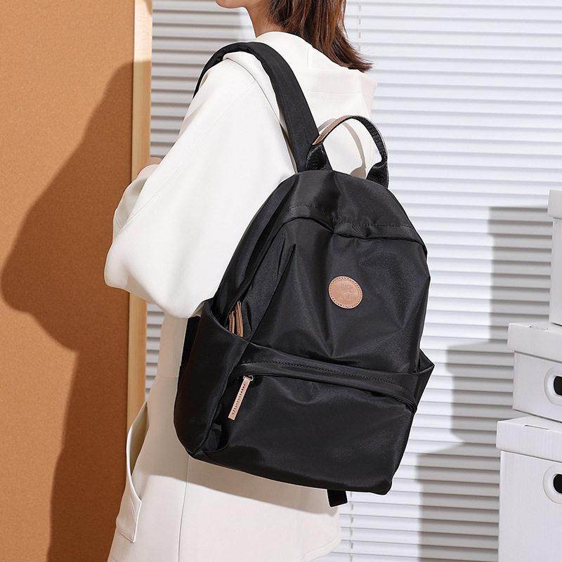 代购日常通勤旅游经典百搭双肩包轻便大容量通勤牛津布揹包宠物包