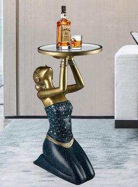 傣族风格无障碍豪华高端落地摆件收纳托盘旁边的电视柜创意艺术家