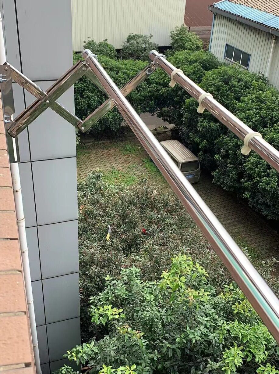 加厚加大不锈钢窗外伸缩晾衣架墙壁晾衣架晾衣杆子晒被子包安新品