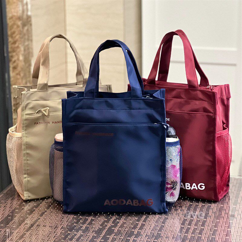 2024新款防水男女学生手提袋A4书袋补课包儿童小学生拎书包手提包