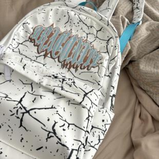 卡通轻便双肩包美式高街小众高中生书包女大学生旅游初中背包男