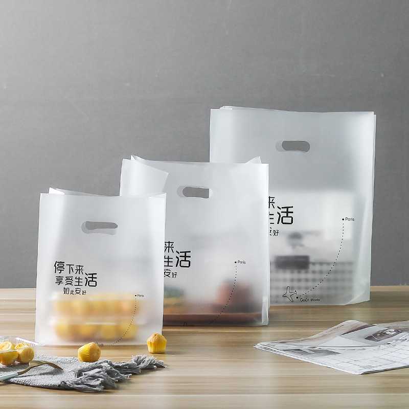 新款直销塑料袋手提袋网红蛋糕盒子便当通用服饰袋子烘焙一次性打