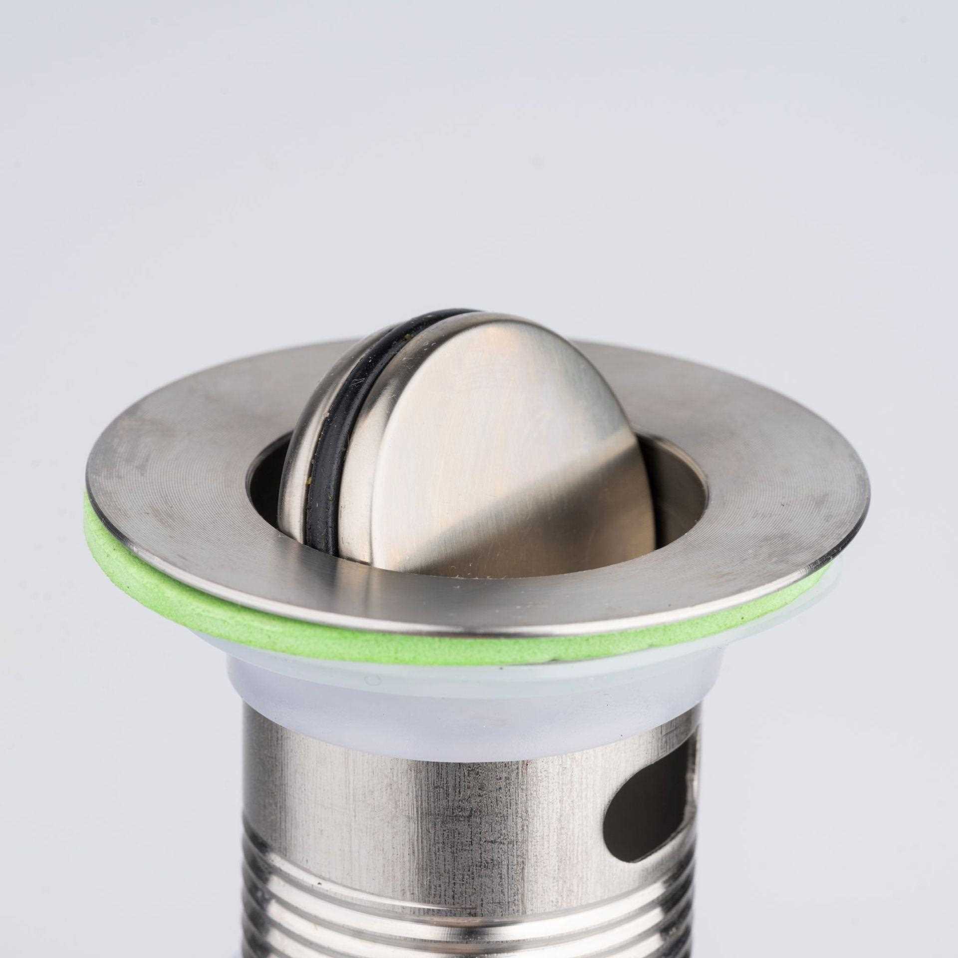 新款直销钢丝连体一体下水管不锈钢洗脸面盆翻板塑料伸缩排水管防