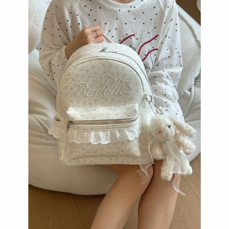 韩系少女风碎花双肩包女学生可爱字母刺绣书包大容量通勤轻便背包