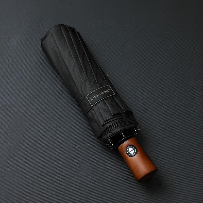 欧士多三全男自动伞10骨黑娜折胶简约加固抗风商务雨伞TWB印logo