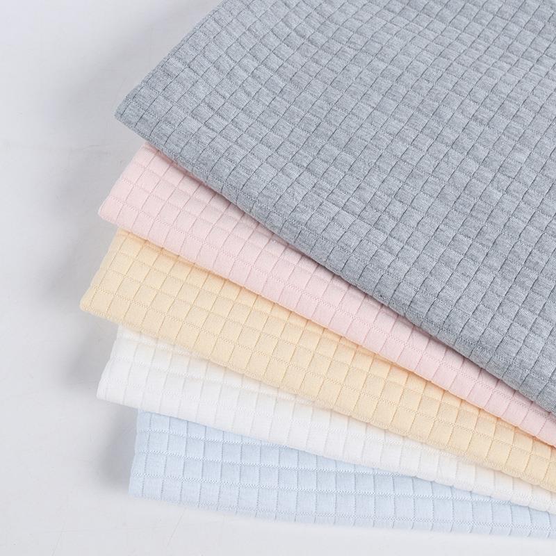 直销新款现货方格子涤氨空气层床垫面料 夹棉针织提花卫衣枕套布