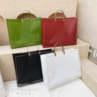 直销新款高档复合塑料袋免税店手提袋服装礼品袋商场购物袋加厚大