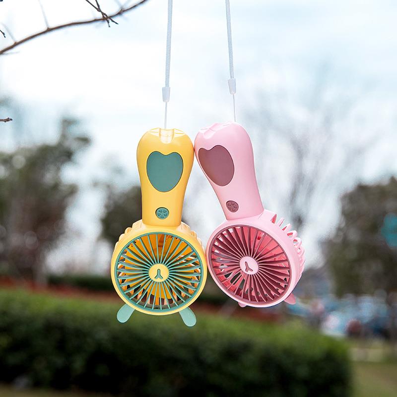 直销新款创意新款卡通可爱手持迷你小风扇充电便携式户外跨境桌面