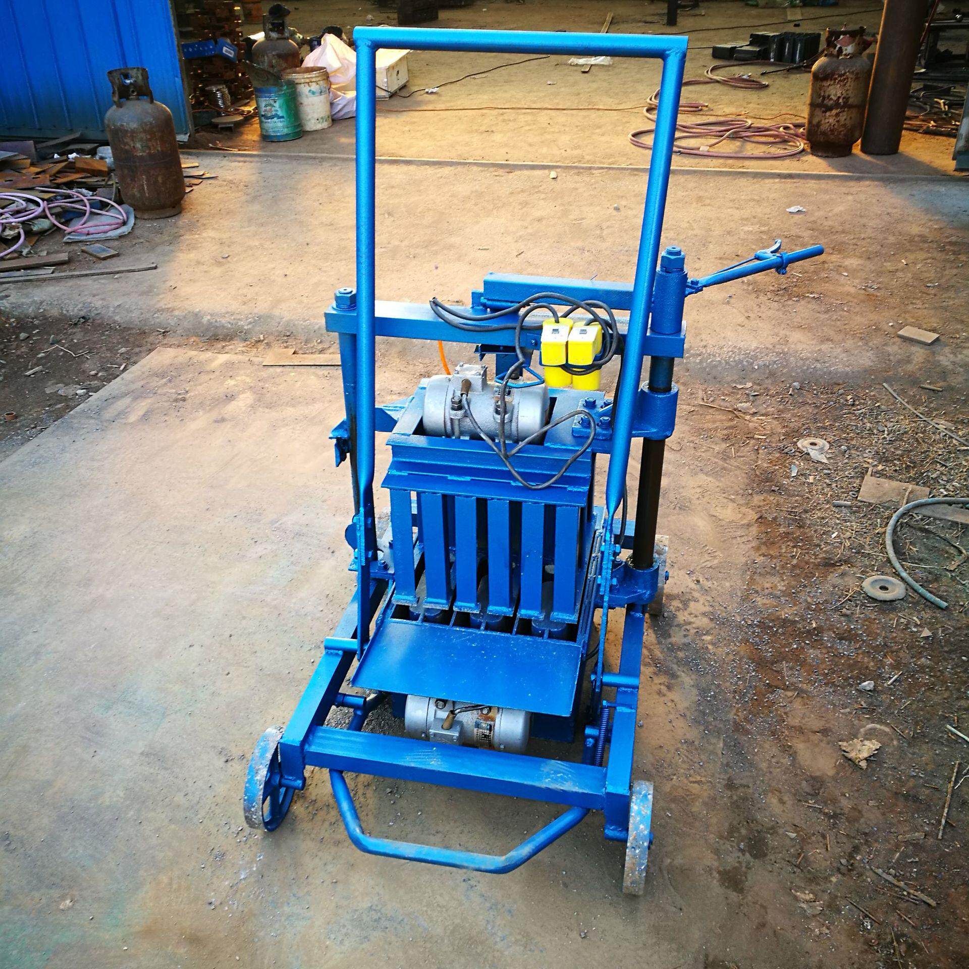 东越生产小型水泥砖机移动式制砖机半自动免烧砖机水泥砌块砖机