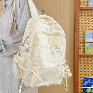 ins风纯色双肩包蝴蝶结初中女生高中大学生书包女旅游轻便小背包