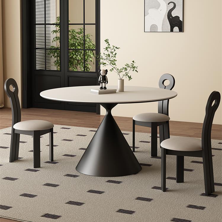 圆形岩板餐桌北欧简约侘寂风设计师家用小户型纯黑纯白饭桌椅组合