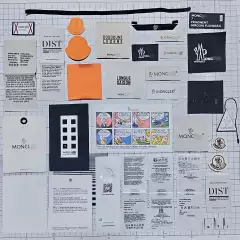 Moncler Neck Labels, Hang Tags, Triangle Tags, Wash Care Labels, Sleeve Labels, Anime Cartoon Labels, Embroidery Labels, Complete Set of Trims - In Stock