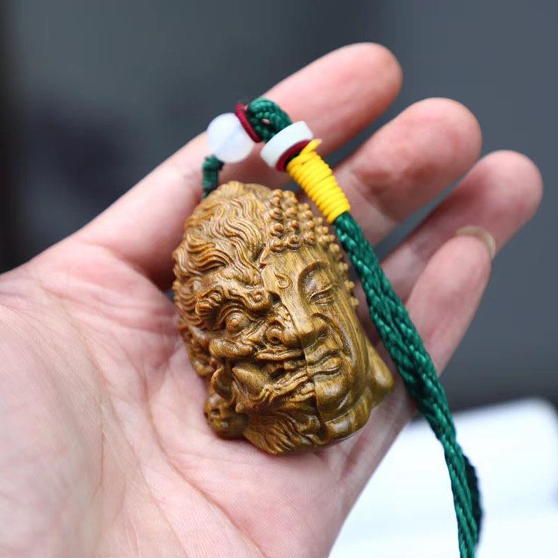 直销新款阿根廷绿檀木雕工艺品手工雕刻一念之间手把件头吊坠手玩