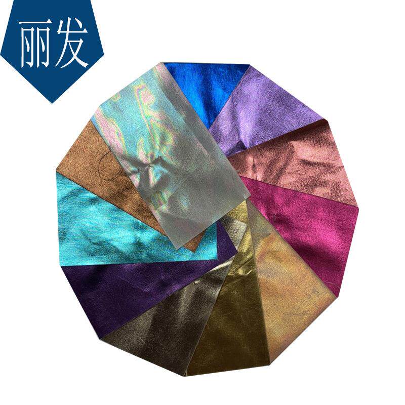 新款直销幻彩镜面镭射七彩虹反光箱包皮革加厚柔软复古炫彩洗水pu