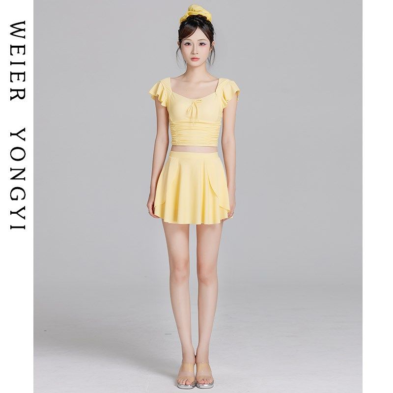 泳衣女高级感2025新款奶黄色分体裙式显瘦海边度假小胸聚拢泡温泉