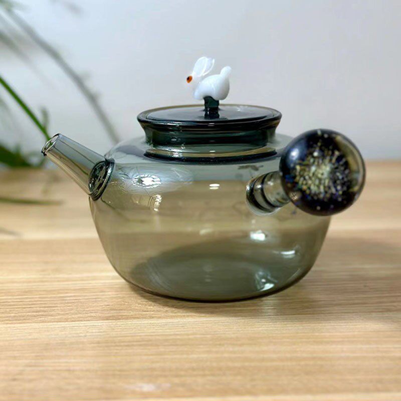 厂家批发高硼硅玻璃茶壶透黑自带过滤孔创意玉兔壶星空侧把煮茶壶