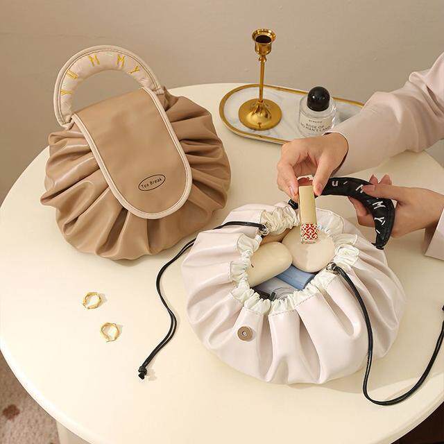 PU都市轻奢简约风化妆包大容量便携车载CD包防水懒人收纳包