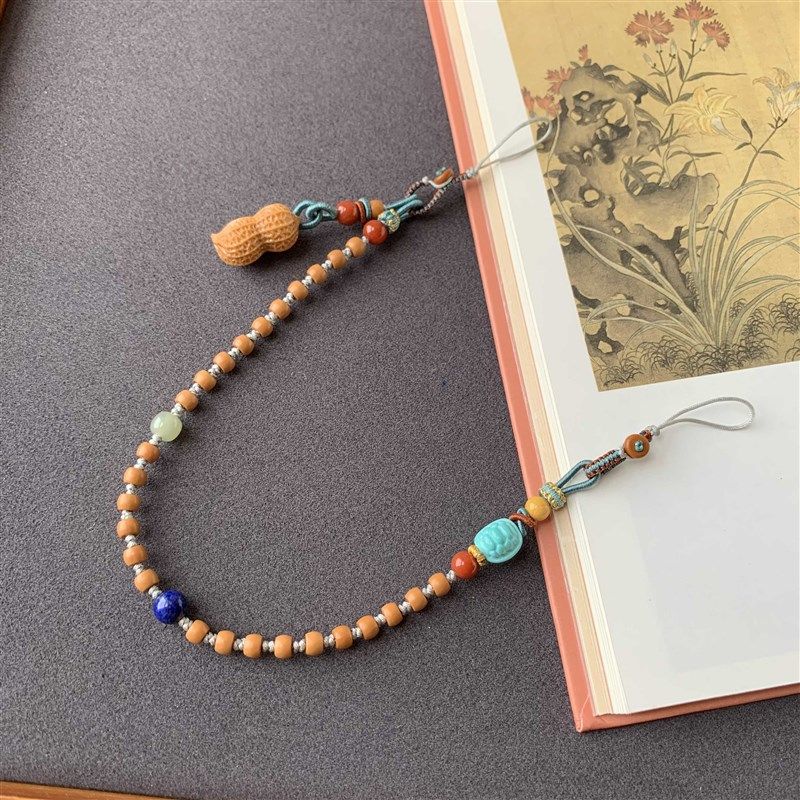 天然橄榄核核尖手机链手机挂坠两用款搭配檀木花生镁磷矿富甲天下