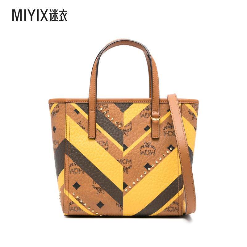 【秋季新品】MCM 鉚釘裝飾手提包女款 迷衣时尚