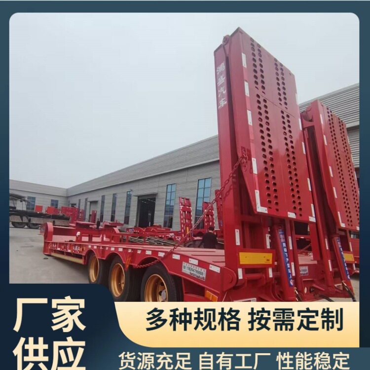 三桥低平板半挂车 拉摊布机双钢轮运输半挂车 双节液压勾机板车