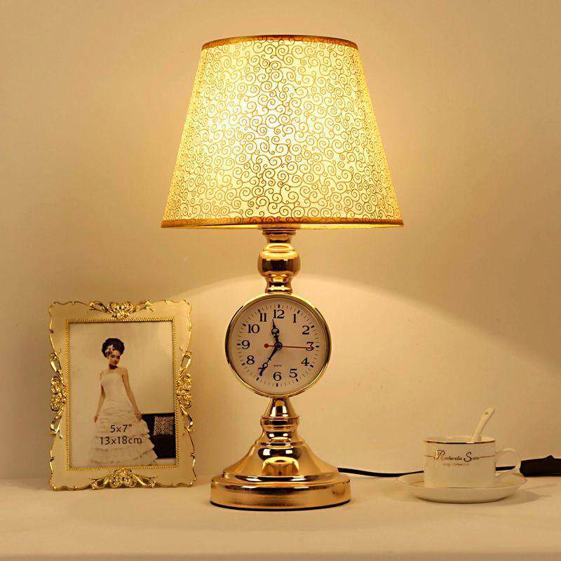 欧简约色带钟表台灯卧室床客厅灯饰灯具式温馨浪头漫金结婚CTW创