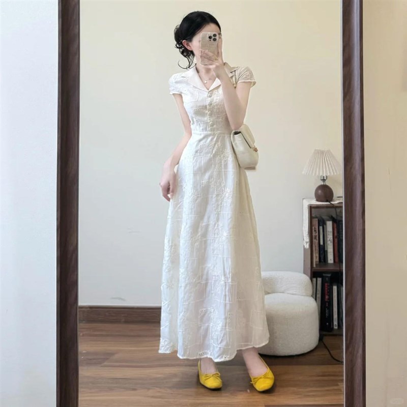 法式温柔风白色短袖连衣裙2025夏季漂亮独特掐腰度假收腰气质长裙