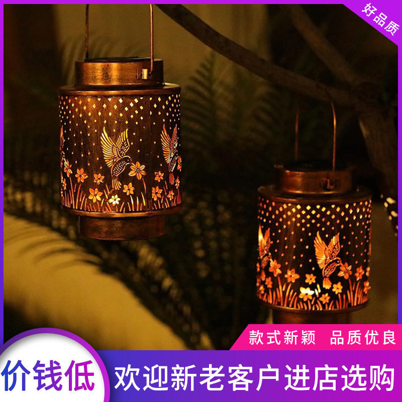 太阳能铁艺锥型蜂鸟灯笼创意复古户外草坪灯庭院装饰镂空光影挂灯