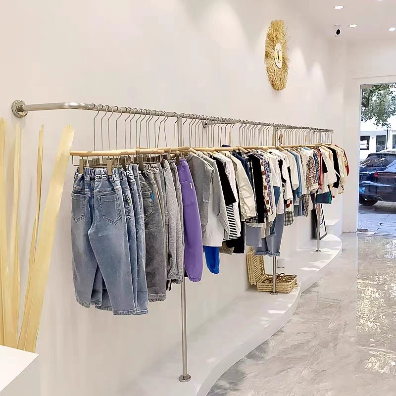 服装店墙上挂衣架女装店不锈钢拉丝货架陈列壁挂架子服装架展示架