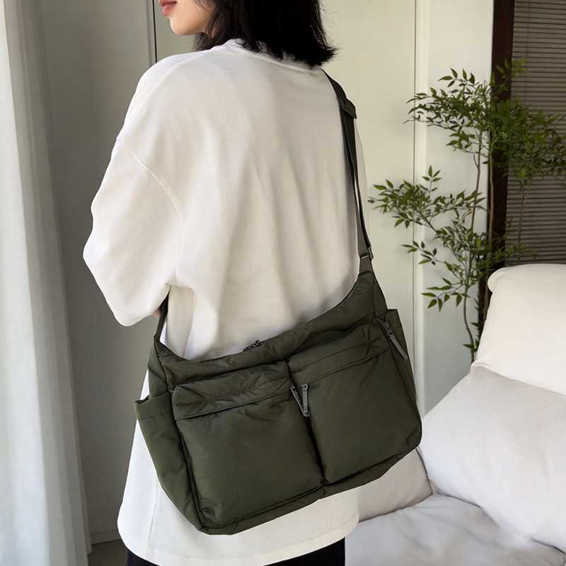 日单男装女装休闲斜背包/单肩