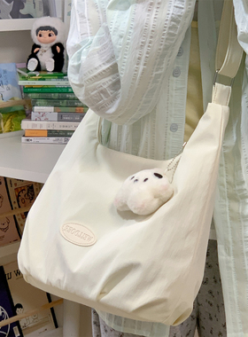 斜挎包女包2025新款单肩包女生帆布包上班通勤百搭邮差学生包包女