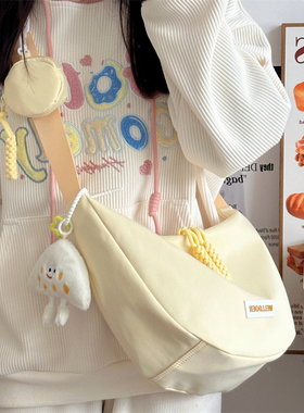 斜挎包包女款饺子包2025新款学生大容量帆布包女孩单肩包通勤布包